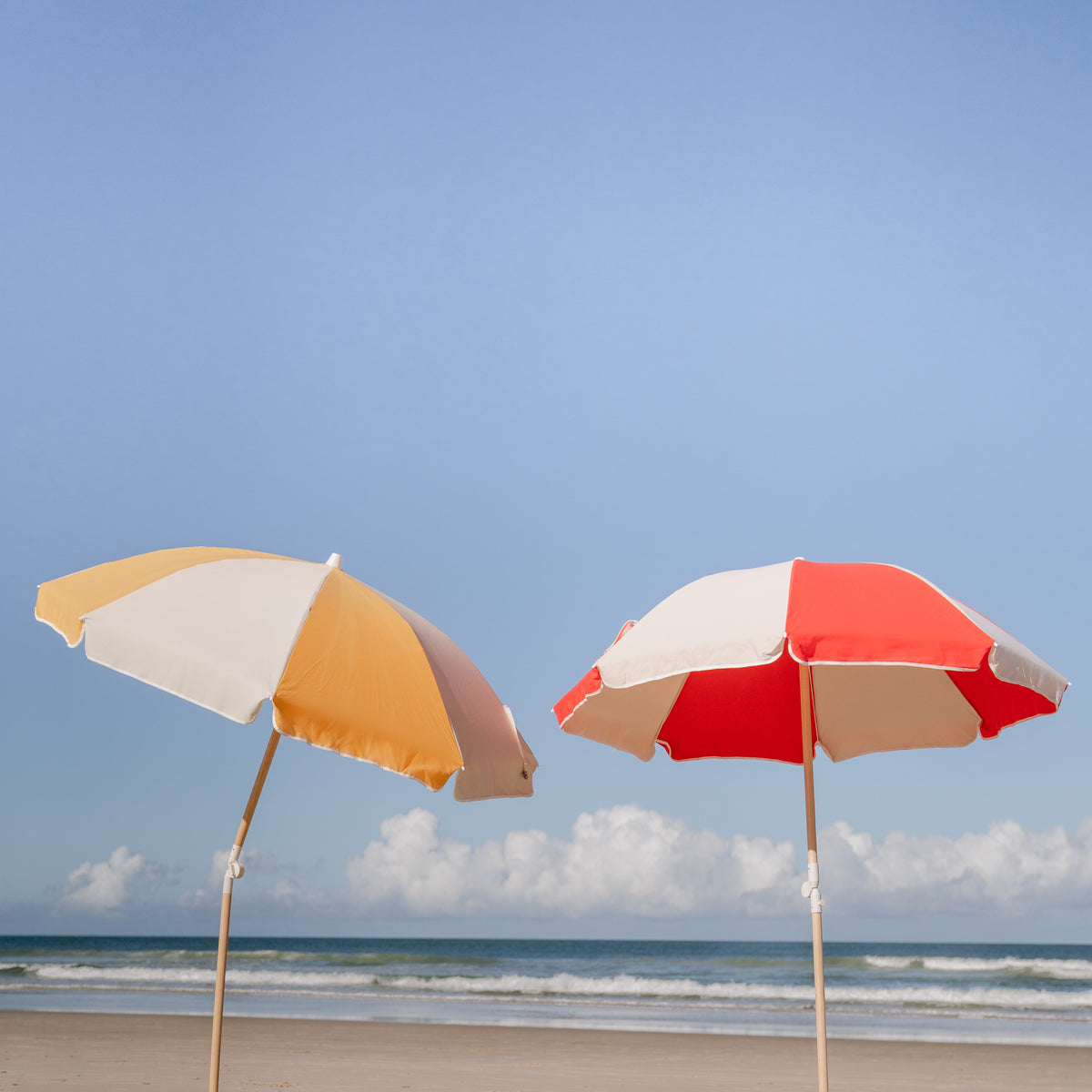 Rio and Golden Splice Beach Umbrellas beside the ocean